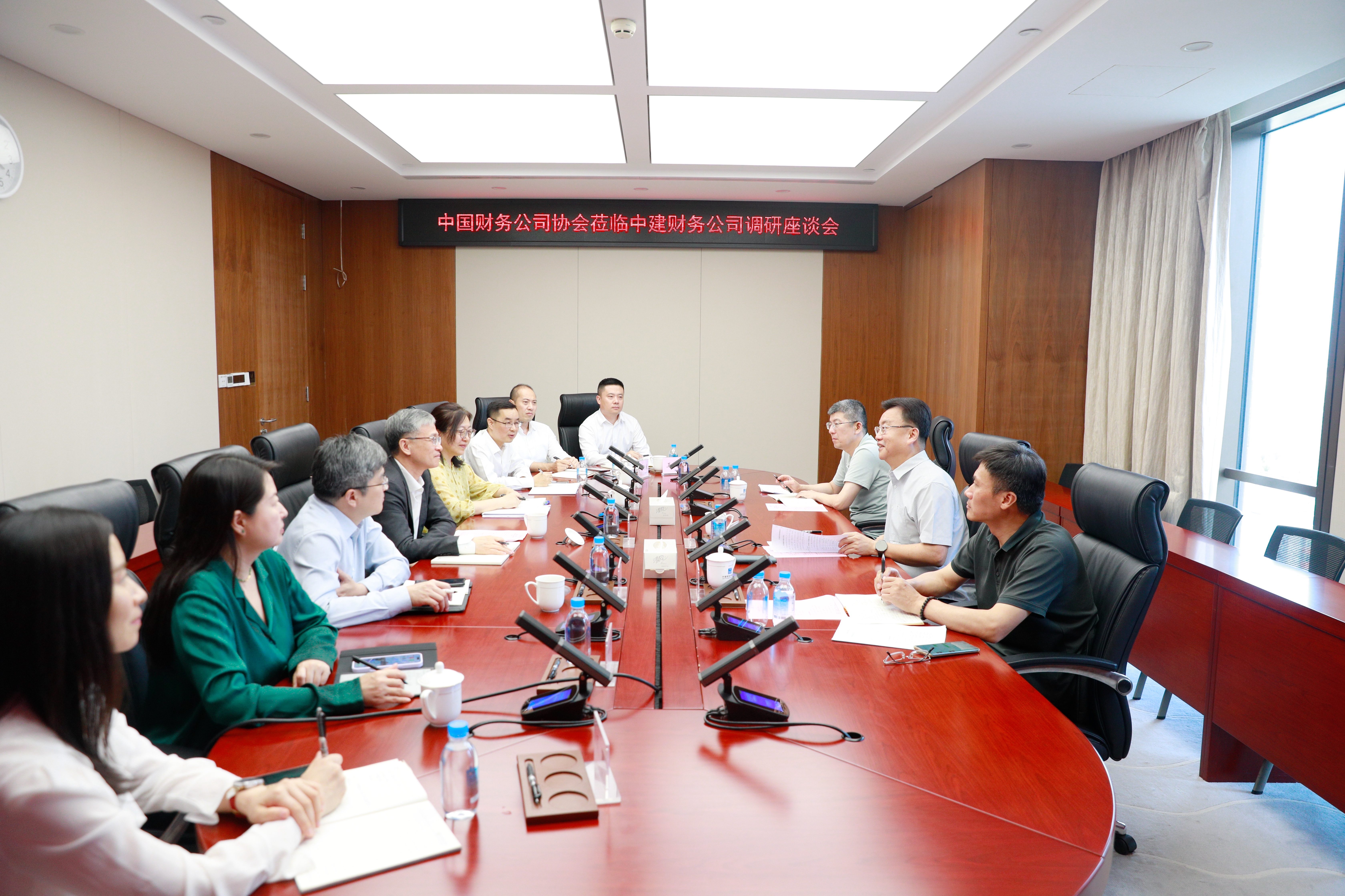 中国财务公司协会党委书记、常务副会长朱进元带队赴中建财务公司开展调研